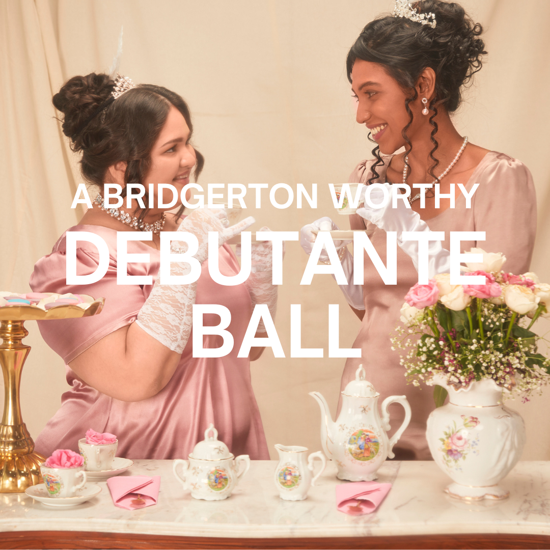two women drinking tea and smiling at each other in front of tea party setup with debutante ball text on top